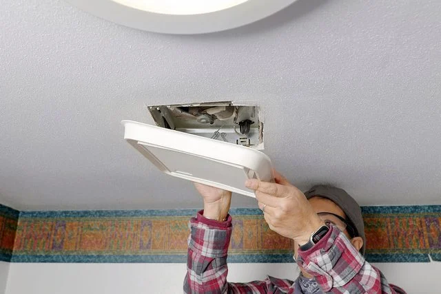 close-up view of bathroom fan wiring installation